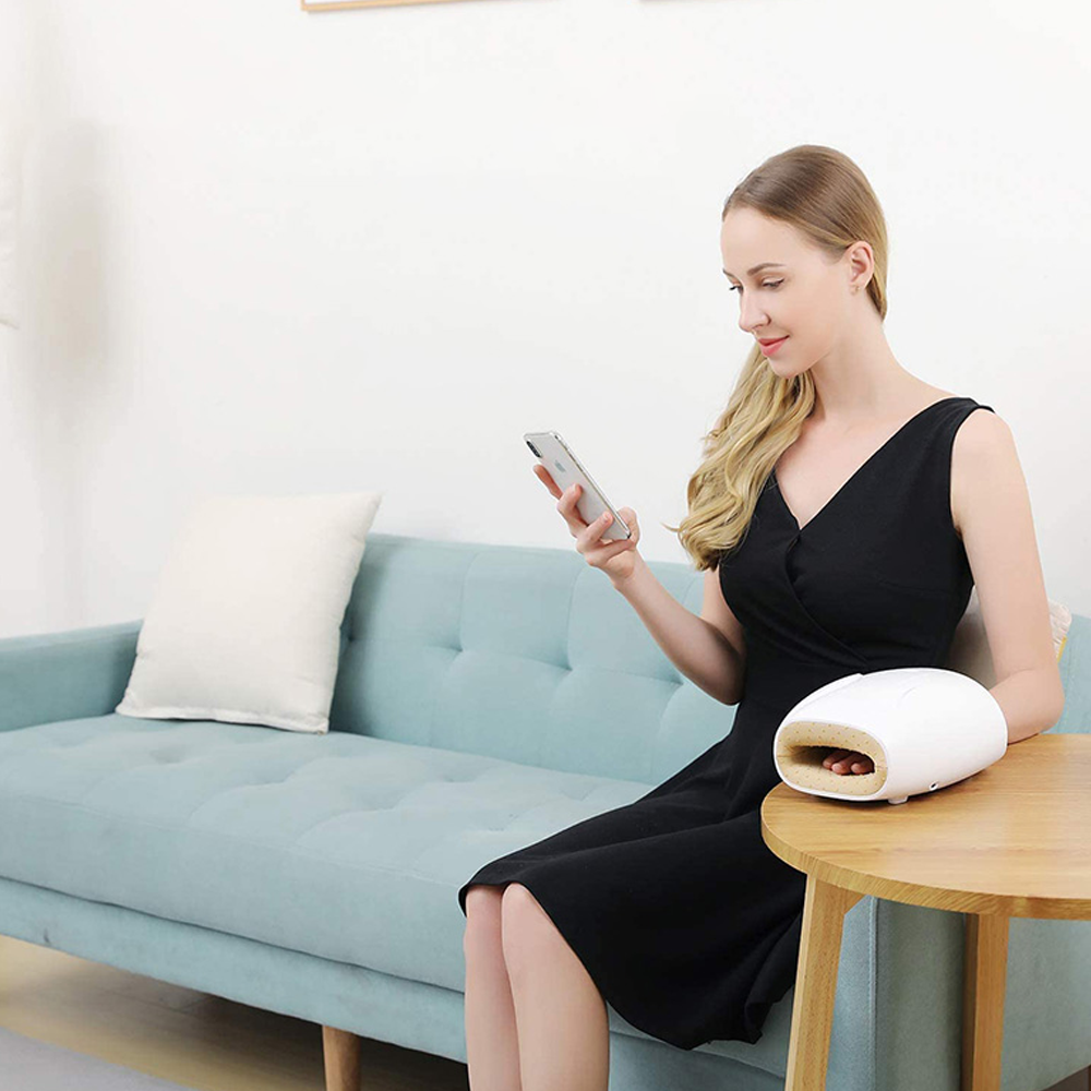 Wireless hand massager with heat and compression