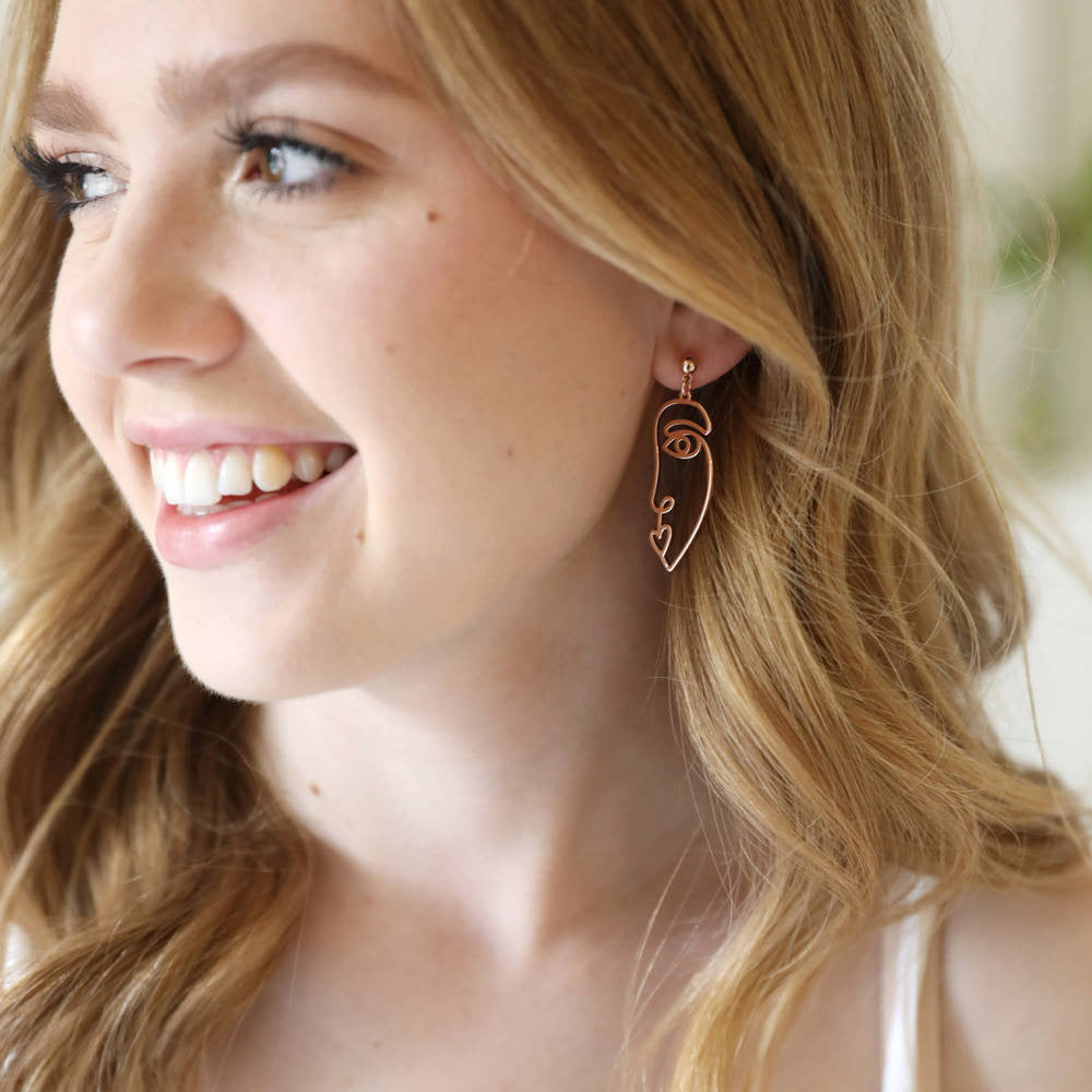 Zinc Alloy Wire Face Earrings 6