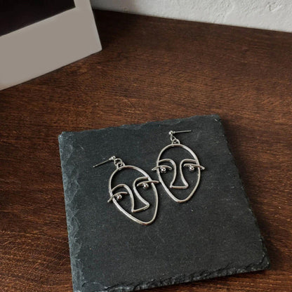 Zinc Alloy Wire Face Earrings 2