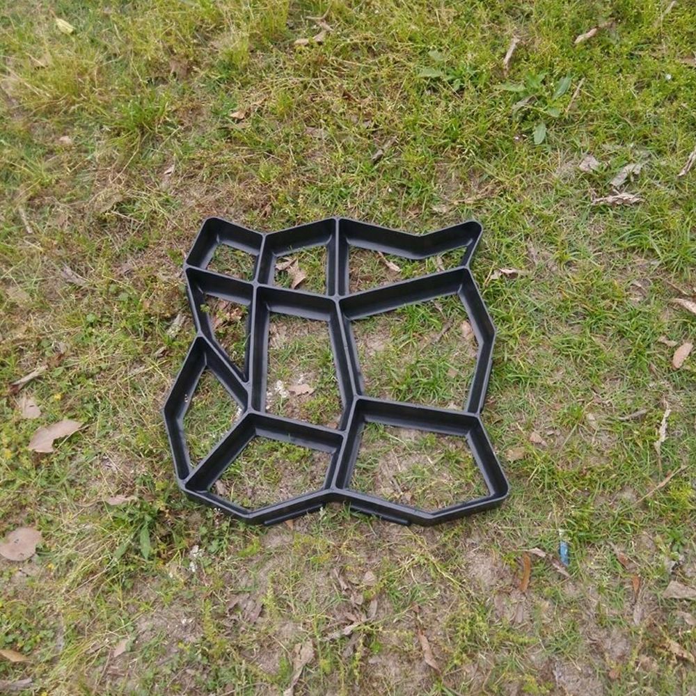 DIY garden path maker mold creating concrete walkway