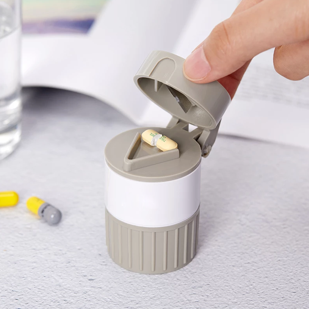 Portable medicine dispenser with grinding feature
