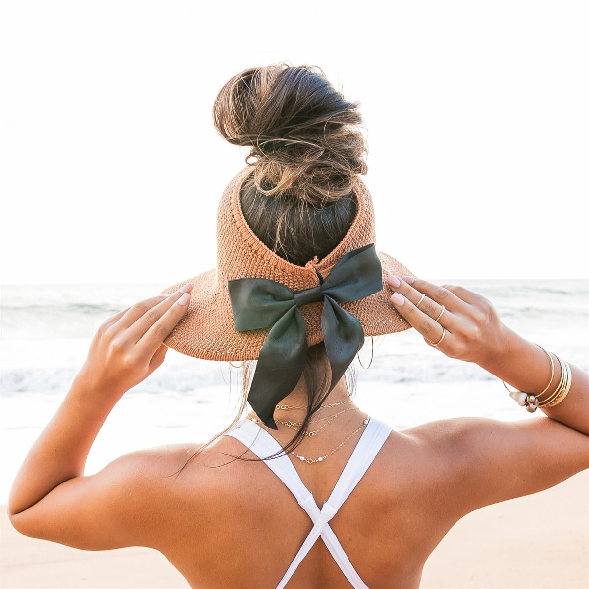 Wide brim straw hat with bow for women