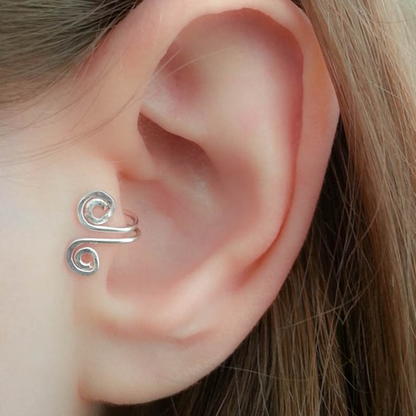 Woman wearing acupressure earrings for natural weight loss