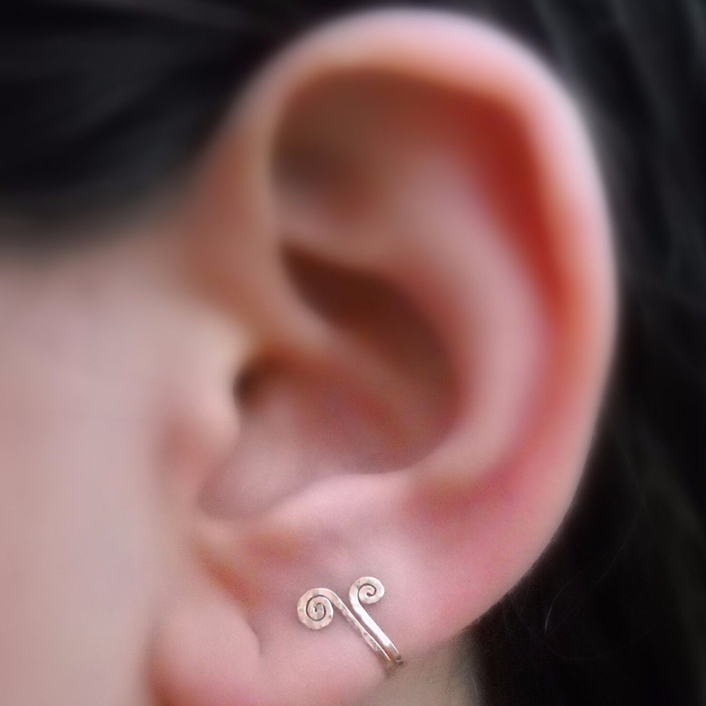 Closeup of stylish earrings enhancing metabolism