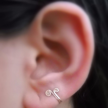 Closeup of stylish earrings enhancing metabolism
