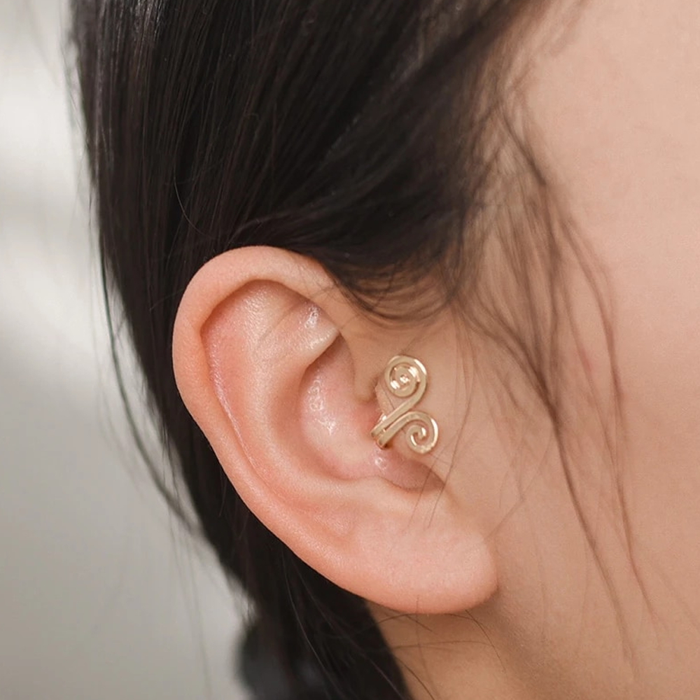 Nonpiercing earrings stimulating ear pressure points
