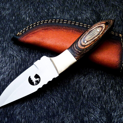 Custom handmade bowie knives dist of florida.jpg