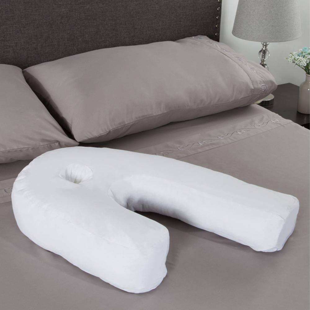 Person comfortably resting their head on the pillow