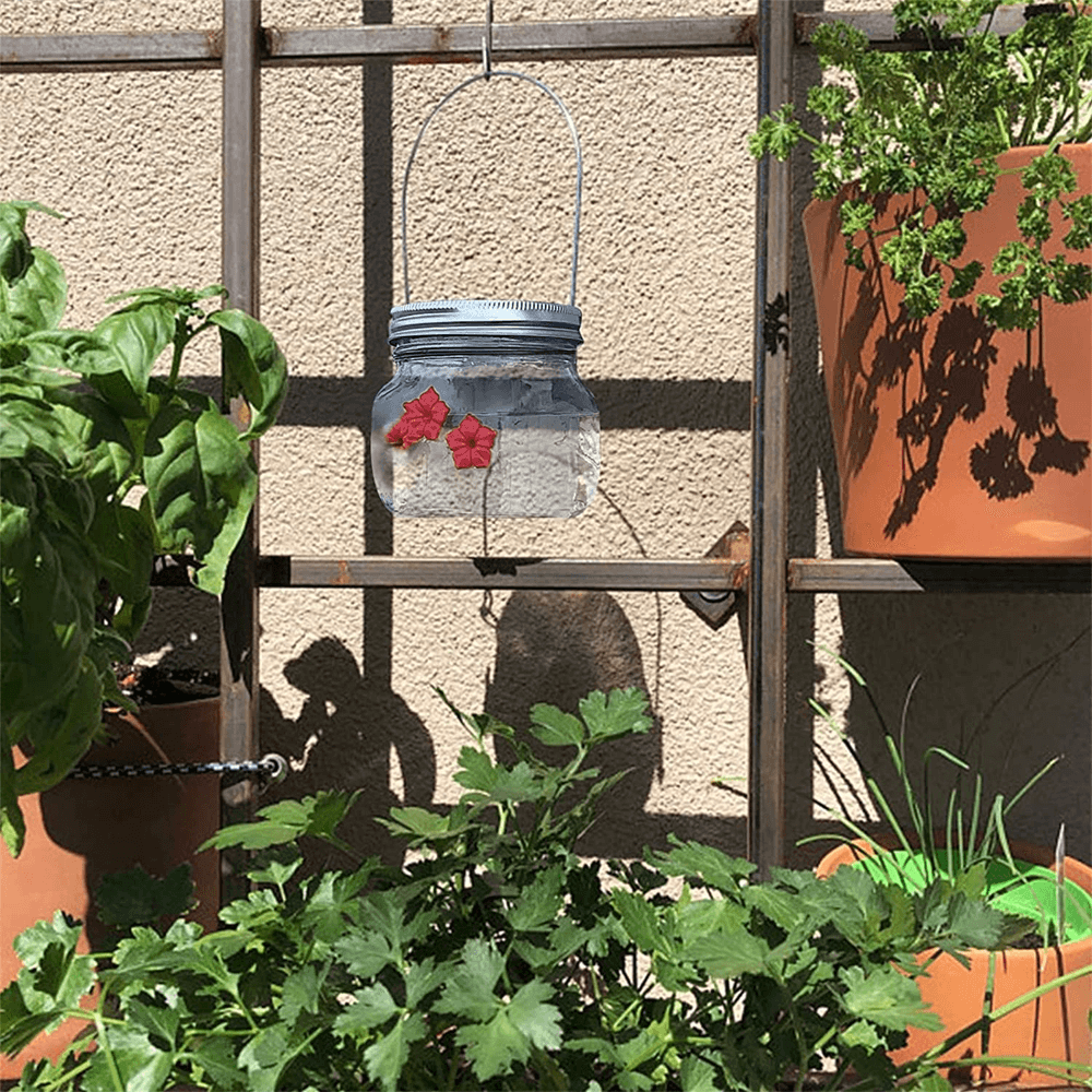 beautifulmasonjarhummingbirdfeederwiththreeports3.png
