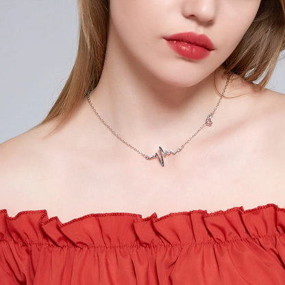 Gold & Silver Heartbeat Necklace (2).jpg