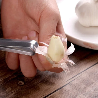 epsB1-3PCS-Stainless-Steel-Garlic-Peeler-Quickly-Garlic-Peeling-Pig-Hair-Plucking-Clip-Manual-Tweezers-Gadgets.jpg
