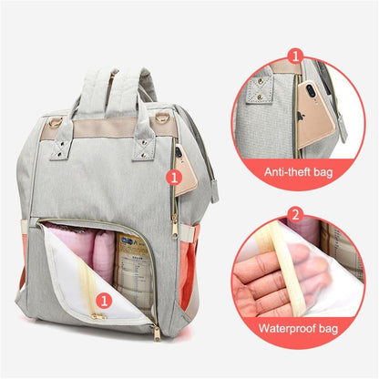Large capacity diaper bag with laptop sleeve