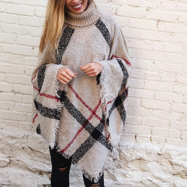 Stay Warm and Stylish with Our Cozy Poncho Sweater