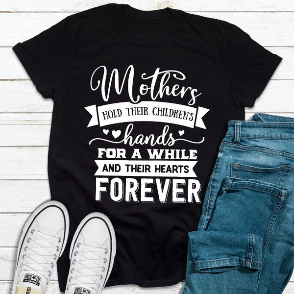 Mothers Hold Their Children's Hands For A While.jpg