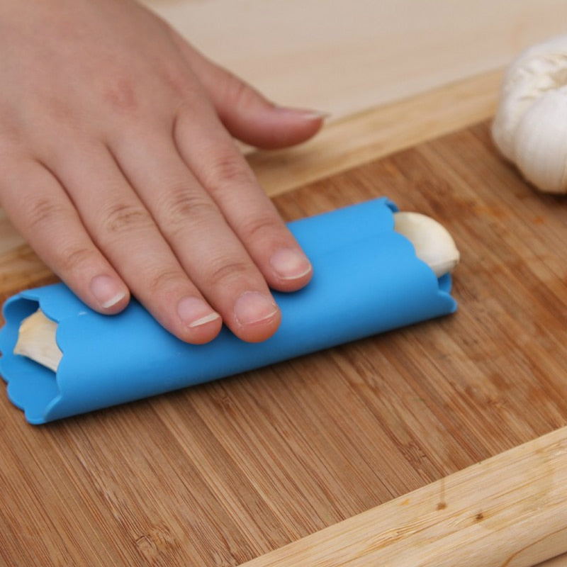 1CB1Creative-household-goods-practical-kitchen-daily-necessities-home-daily-necessities-garlic-peeler-food-grade-silicone-material.jpg