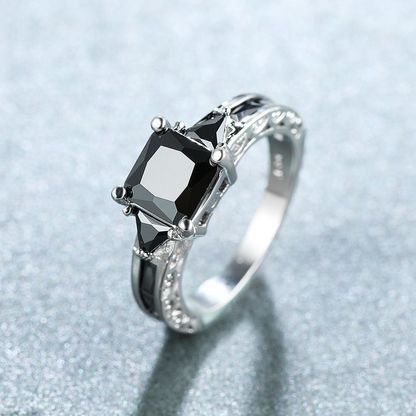 EbdkDelicate-Silver-Color-Trendy-Ring-for-Women-Elegant-Princess-Cut-Inlaid-Black-Zircon-Stones-Wedding-Ring.jpg