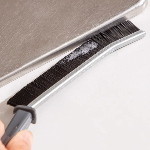 Ergonomic design crevice brush for deep cleaning