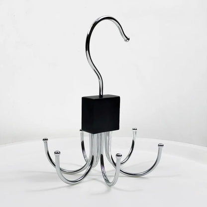 Closet belt hanger with rotating design
