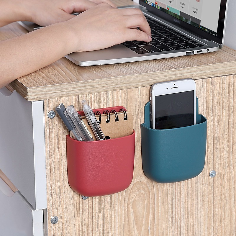 Wall mounted storage box for AC remote