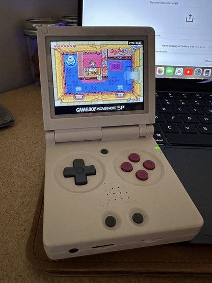 ANBERNIC RG35XXSP Flip Handheld Game Console 35 IPS Clamshell Linux System 64G Storage Online