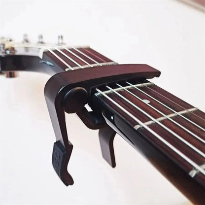 7pcs Guitar Capo Set For Acoustic  Electric Guitars  Includes 5 Free Picks  1 Holder  Available In  3