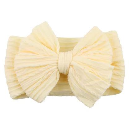 SnuggleSoft Baby Bow Headband  Stretchy Nylon Hair Accessory For Newborns And Toddlers 8