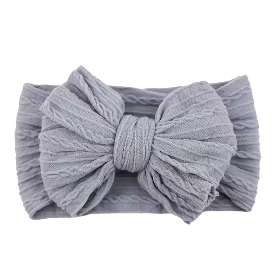 SnuggleSoft Baby Bow Headband  Stretchy Nylon Hair Accessory For Newborns And Toddlers 12