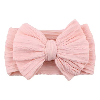 SnuggleSoft Baby Bow Headband  Stretchy Nylon Hair Accessory For Newborns And Toddlers 14