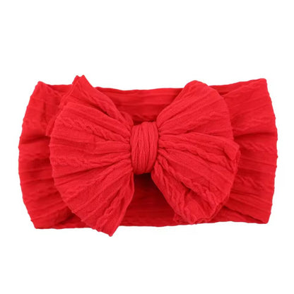 SnuggleSoft Baby Bow Headband  Stretchy Nylon Hair Accessory For Newborns And Toddlers 18