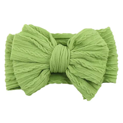 SnuggleSoft Baby Bow Headband  Stretchy Nylon Hair Accessory For Newborns And Toddlers 24