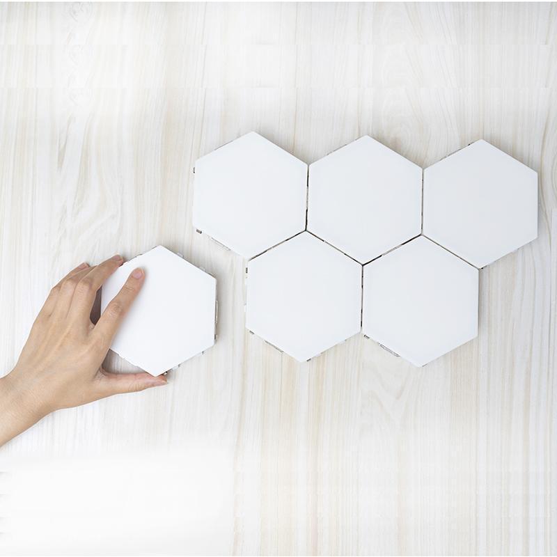 Closeup of magnetic LED tiles with touchsensitive controls for individual tile activation